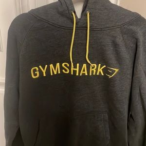 Medium sized charcoal grey and yellow gym shark hoodie.